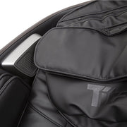 Titan Jupiter LE Premium Massage Chair with a silver control tablet on the seat, showcasing its advanced features for ultimate comfort and wellness.