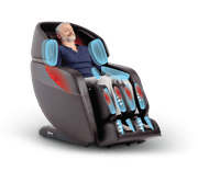 A man sitting in the Daiwa Legacy 4 Massage Chair with his eyes closed, experiencing a relaxing massage.