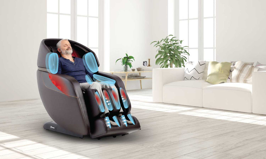 A man sitting in a Daiwa Legacy 4 Massage Chair, enjoying its advanced massage features in a modern, well-decorated living room.