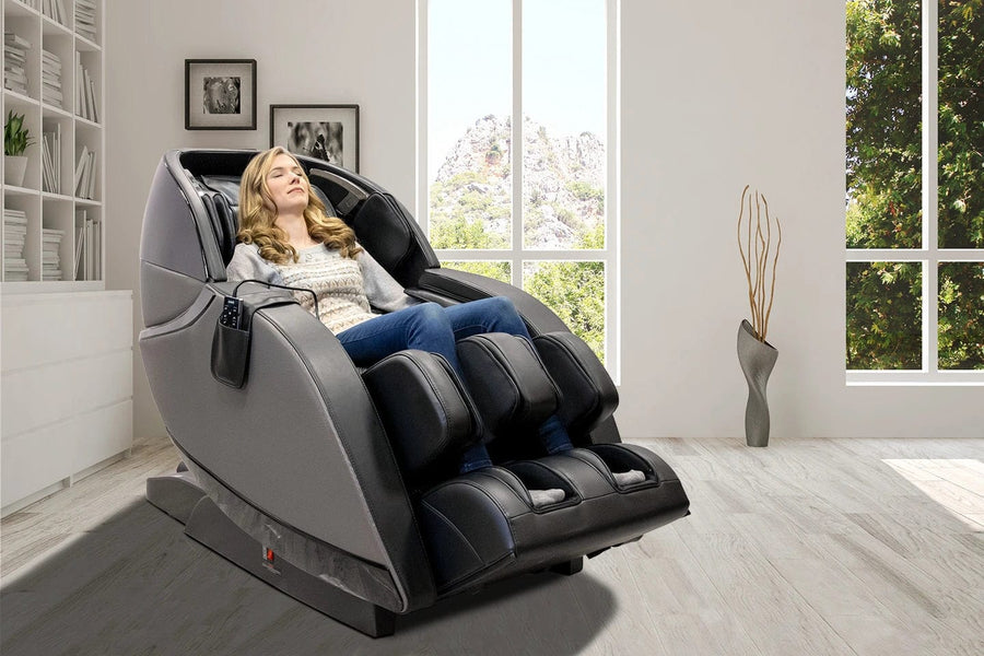 A woman relaxing in the Kyota Kansha M878 Massage Chair, enjoying a professional massage experience at home.