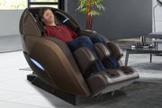 A man sleeping in the Kyota Yutaka M898 Massage Chair, showcasing its therapeutic features and advanced technology.