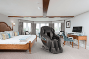 Medical Breakthrough 10 massage chair in a bedroom, designed to enhance posture, reduce pain, and aid sleep with advanced therapeutic systems.