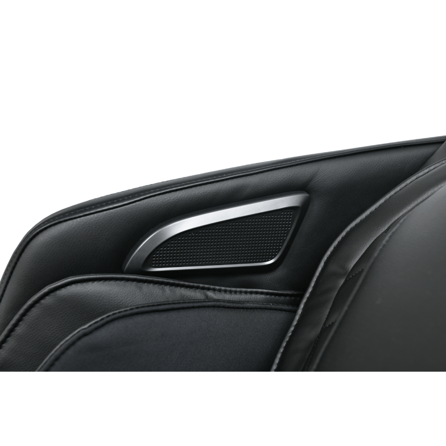 Close-up of the RockerTech Sensation 4D Massage Chair's black leather seat and integrated speaker.