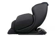 Sharper Image Revival Massage Chair with black leather upholstery, reclining feature, armrests, and integrated reflexology rollers for a full-body massage experience.